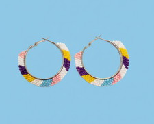 Handmade Seed bead hoop earrings in Nativ American style.