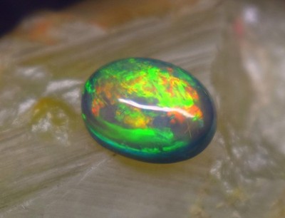 2.1 Ct AAA Greenish Fire Opal | Black Natural Ethiopian Oval Cabochon Gemstone