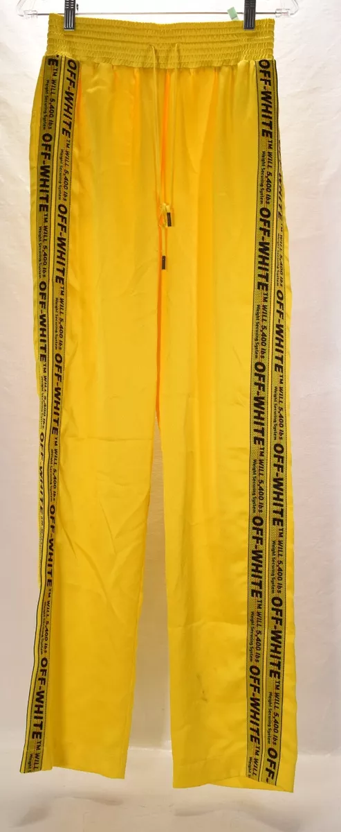 Off-White logo-embroidered flared track pants - Yellow