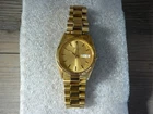 VINTAGE SEIKO QUARTZ WATCH MENS DAY DATE GOLD TONE NEW BATTERY