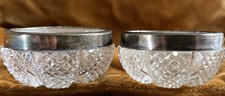 PAIR OF CUT GLASS SALTS  WITH SOLID SILVER HALLMARKED RIMS  BIRMINGHAM 1910