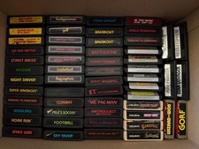 LOT OF 95 ATARI 2600/VCS GAME CARTRIDGES AND 33 GAME MANUALS 