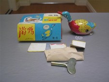 Vintage tin windup swimming duck made in China NMIB