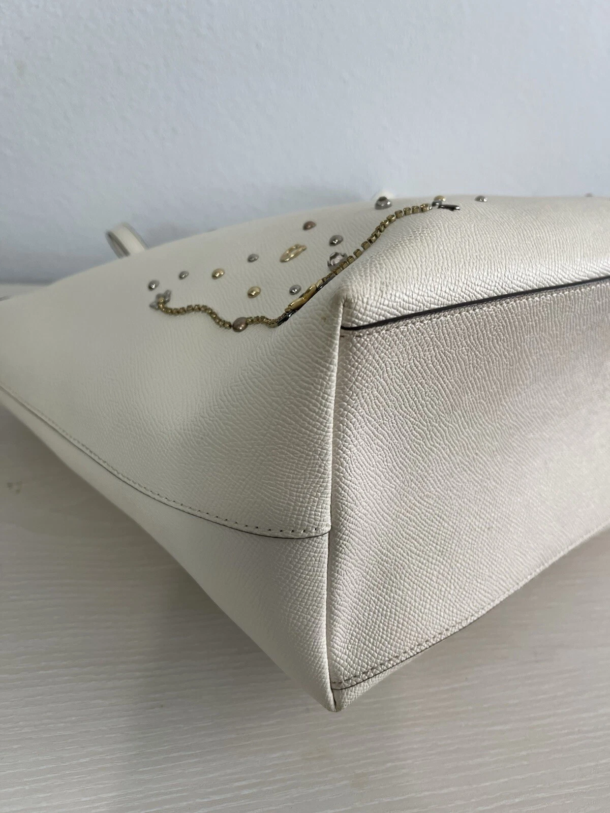 Borsa Coach City con zip e rivetti in cristallo polvere di stelle