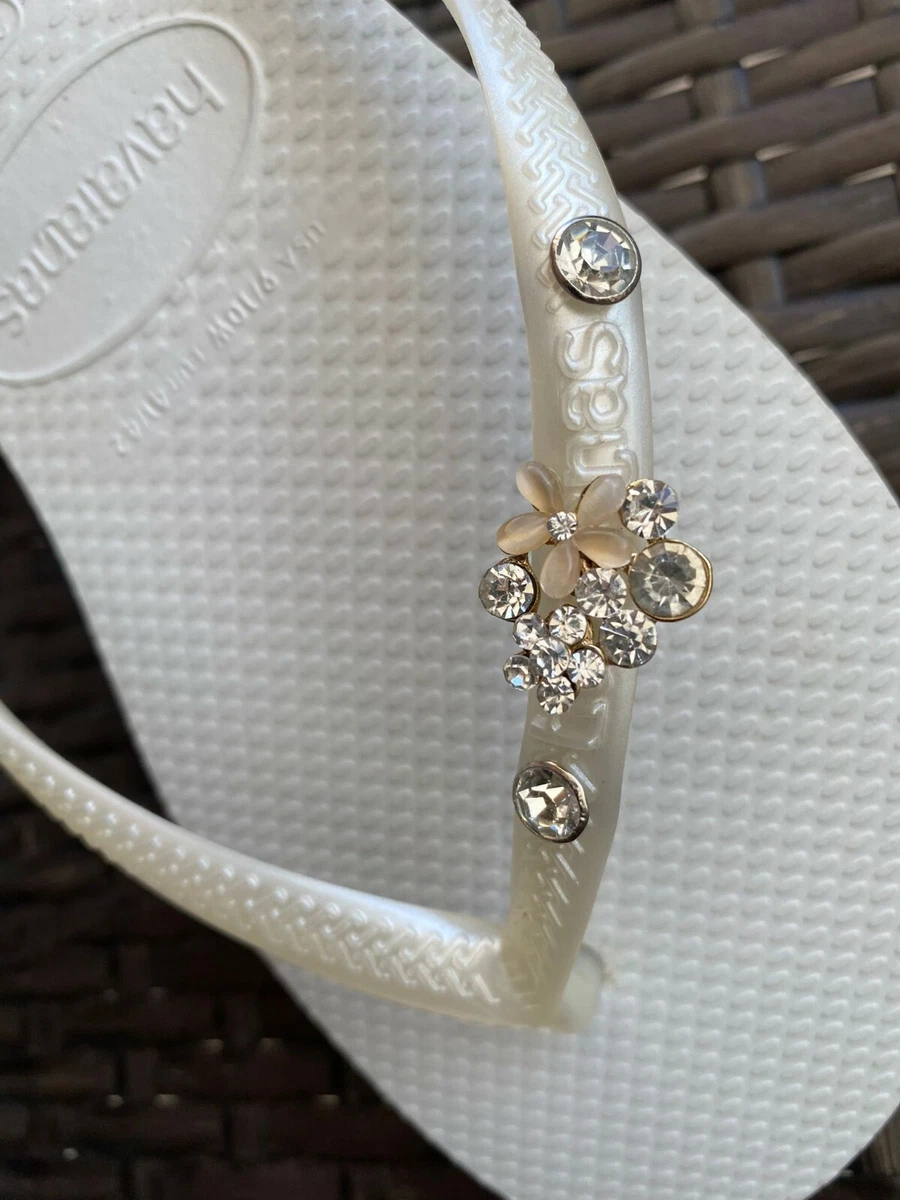 Gold havaianas store with diamante