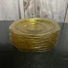 Lot of 7 Vintage Amber depression glass saucers