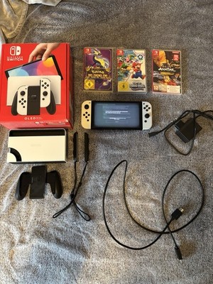 Nintendo Switch OLED Weiß + Mario Wonder + Pokémon Purpur + OVP