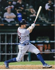 ADAM ROSALES   CLEVELAND INDIANS   ACTION SIGNED 8x10