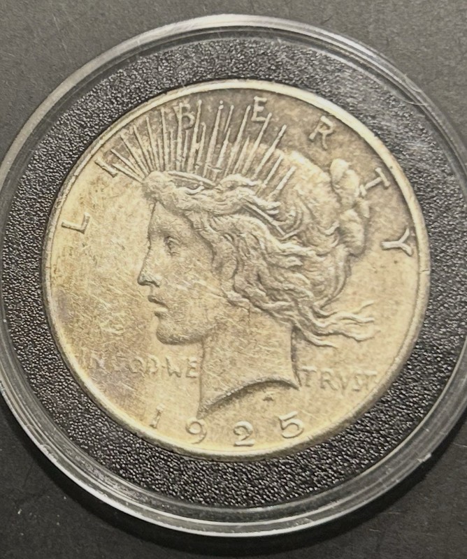 A 1925 S US Peace Silver Dollar Circulated With A Lot Of Detail