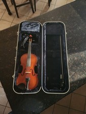 new violin 4/4 - comes with new bow, rosin x2 , metal mute