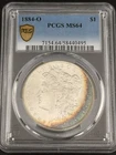 1884-O Morgan Silver Dollar PCGS MS64 Crescent Rainbow Toning Gold Shield