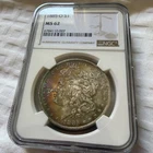1885-O New Orleans Morgan Silver NGC MS 62 Nice Eye Appeal Rainbow Tone