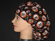 Surgical Scrub Hats/Caps Halloween-Black with Skulls in Orange circles 