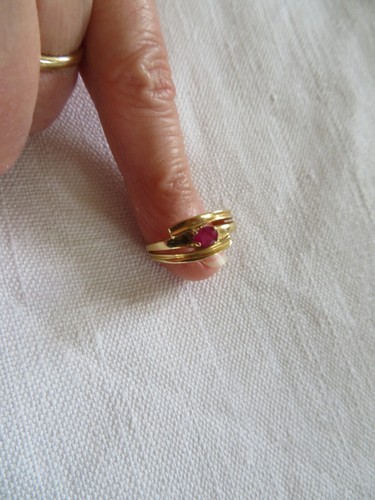 bague en or poinçon tête