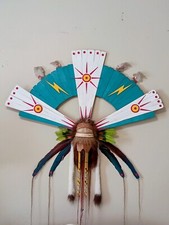 Summer Storm is a hand-crafted wood and feather mask sculpture