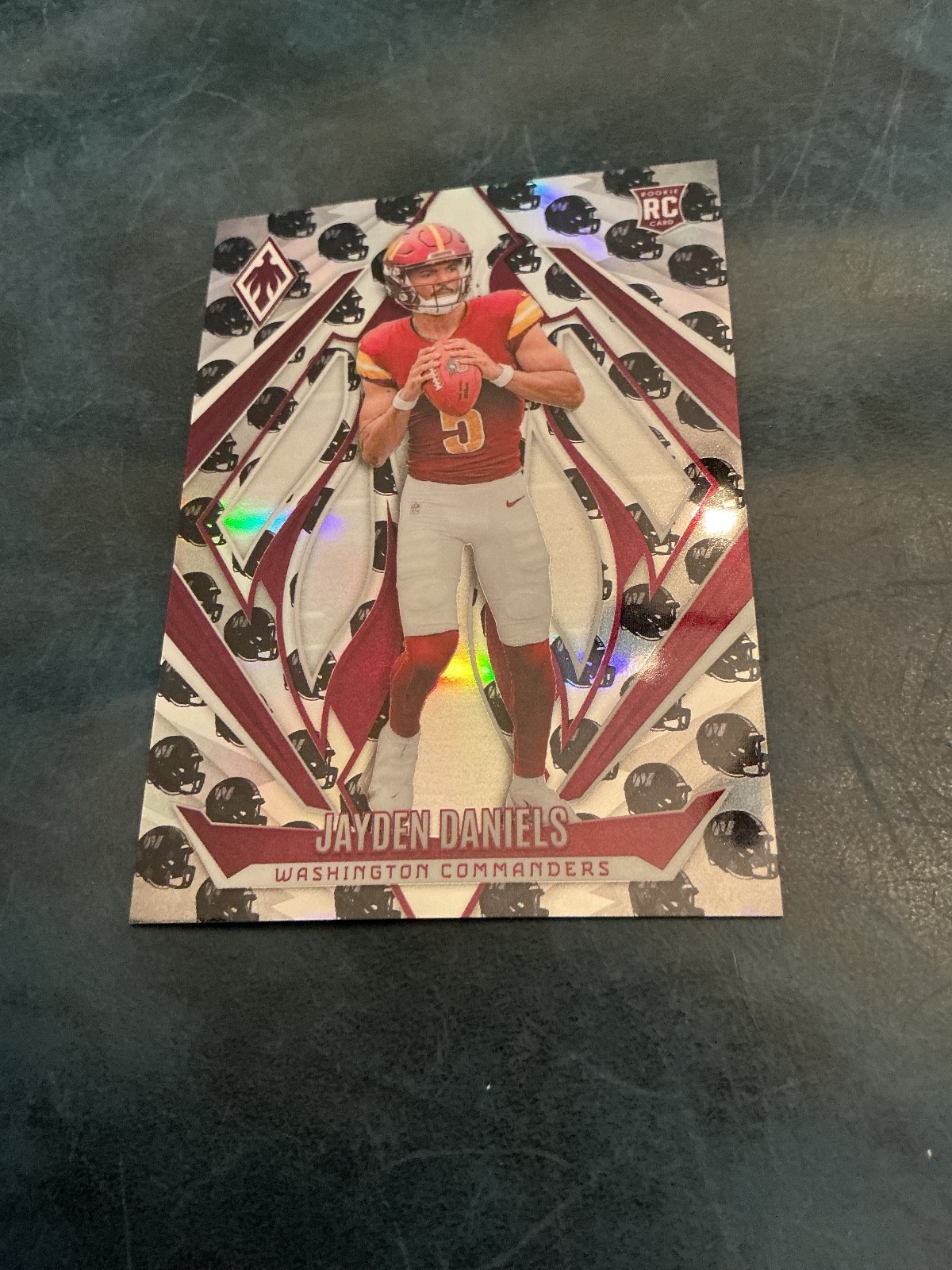 2024 Panini Phoenix - Rookies Jayden Daniels #198 Team Helmet /399 (RC)