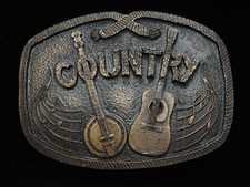 PG17132 NOS VINTAGE 1976  COUNTRY MUSIC  COMMEMORATIVE BRASSTONE BUCKLE