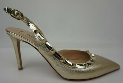 gold slingback pumps