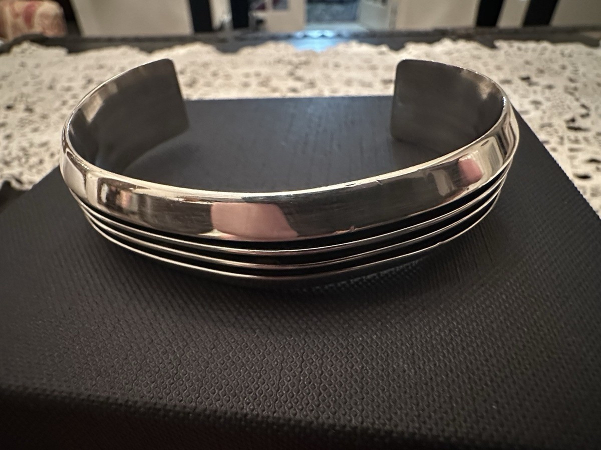 Handcrafted Tom Hawk Navajo three Channel “RAIL” Sterling Silver