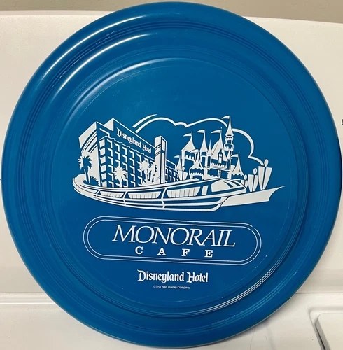 MONORAIL CAFE  FRISBEE  - 1995 DISNEYLAND HOTEL w SLEEPING BEAUTY CASTLE