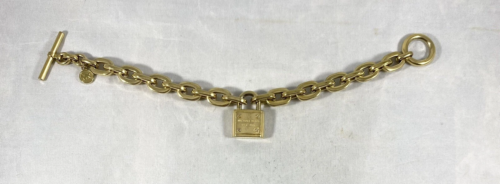 Bracciale Michael Kors Lucchetto Toggle Tono Oro Lungo 8”