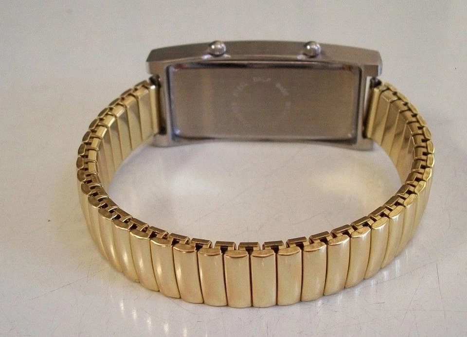 Reloj de moda mujer correa elástica acabado plata y oro doble hora (2 zona horaria) Foto 3 de 4