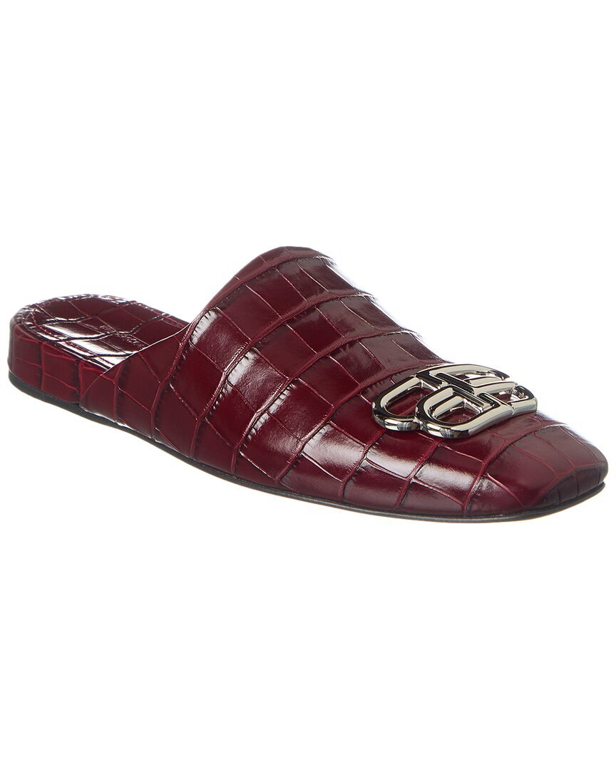 Женские мулы из кожи с тиснением под крокодила Balenciaga Cosy Bb Croc 78990₽