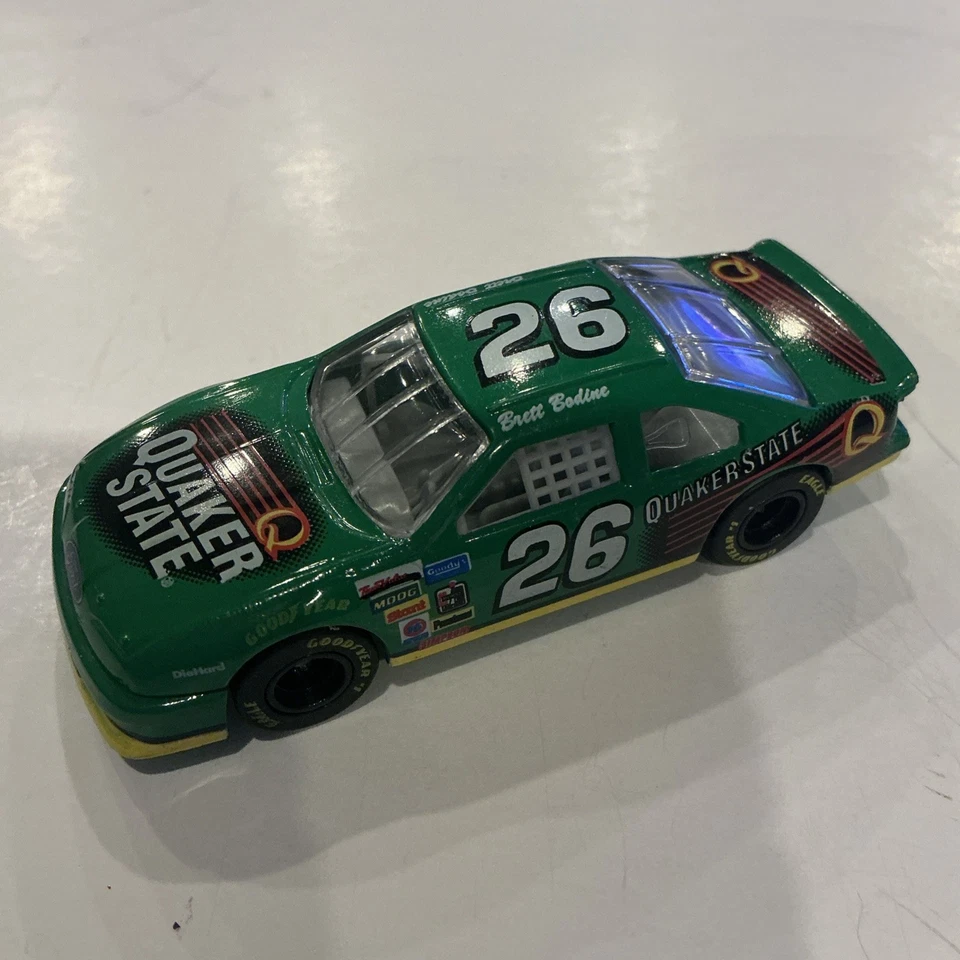 Винтаж 1992 гоночные чемпионы Brett Bodine No26 Ford Teebird квакерское государственное масло - Изображение 2 из 2