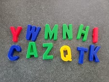 Lot Of 12 Plastic Magnetic Letters