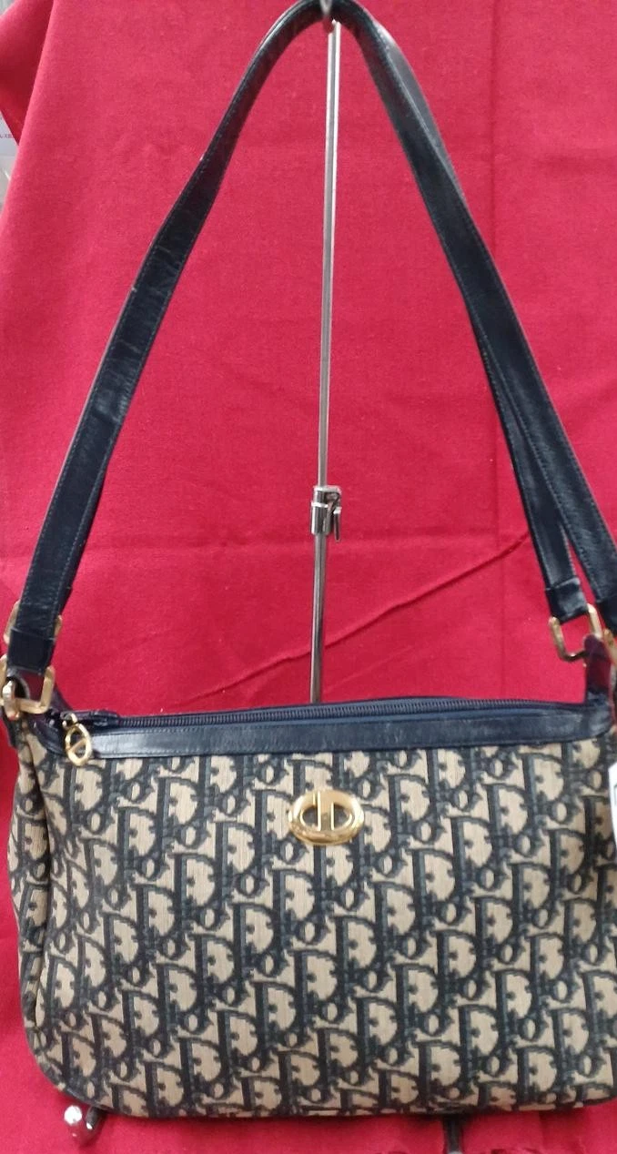 Sac bandoulière trotteur DIOR avec décoloration vintage