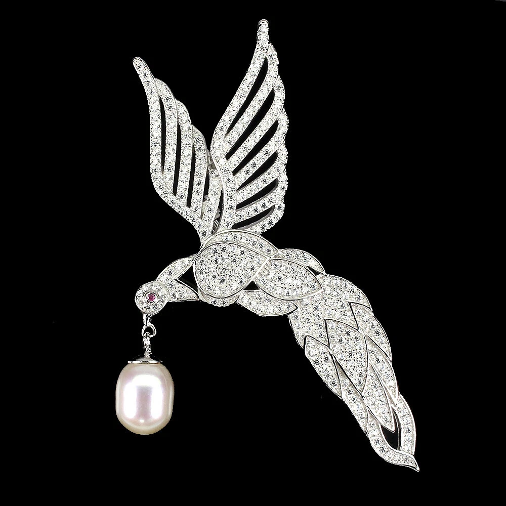 Broche argentée en forme d'oiseau | En stock