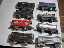 9 VINTAGE TIN MARX TRAINS - CABOOSE,  BOX CARS, TANKERS & PASSENGER