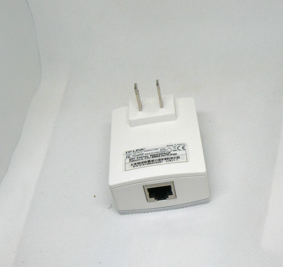 Adaptador Ethernet TP-Link AV600 Powerline Plug Play 600Mbps TL-PA4010 Foto 2 de 3