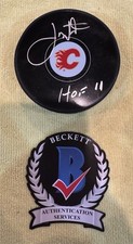 Joe Nieuwendyk Autographed Calgary Flames Hockey Puck HOF 11 Witness Beckett