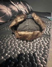 black fur hat unisex for men and women with tan fur