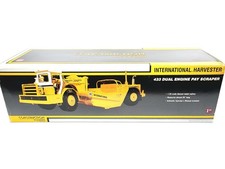 Raspador de pago International IH 433 - amarillo - primera marcha escala 1:25 #70-0180 nuevo