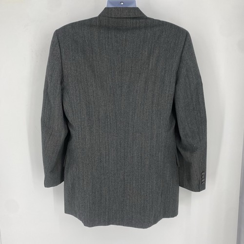 Grey vintage Christian Dior Monsieur suit jacket with subtle vertical pinstripes, notch lapel, and back zipper closure.