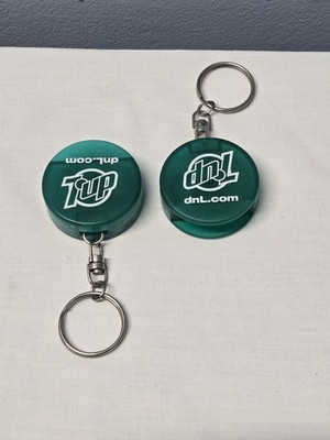 2 7up DNL Upside Down CD Opener Keychain Soda Pop Advertising