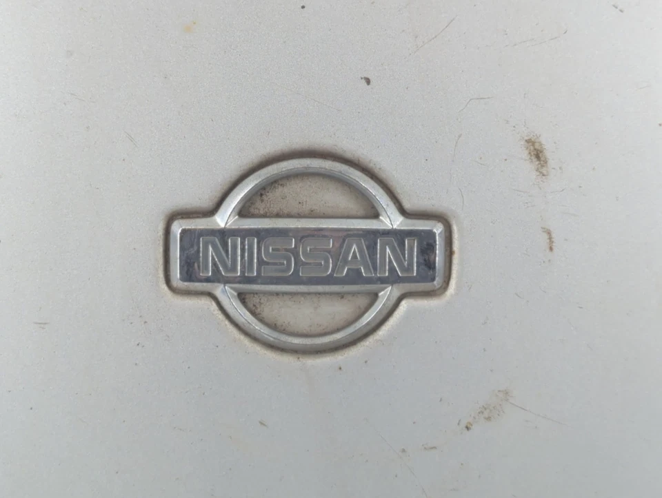 Cubierta de rueda tapacubos Nissan Altima 1994 OEM Foto 2 de 4