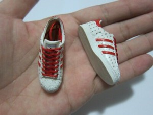 action white sports shoes