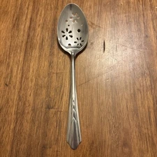 Vintage EKCO Stainless Groovy Flower Slotted Pierced Serving Spoon 8” USA