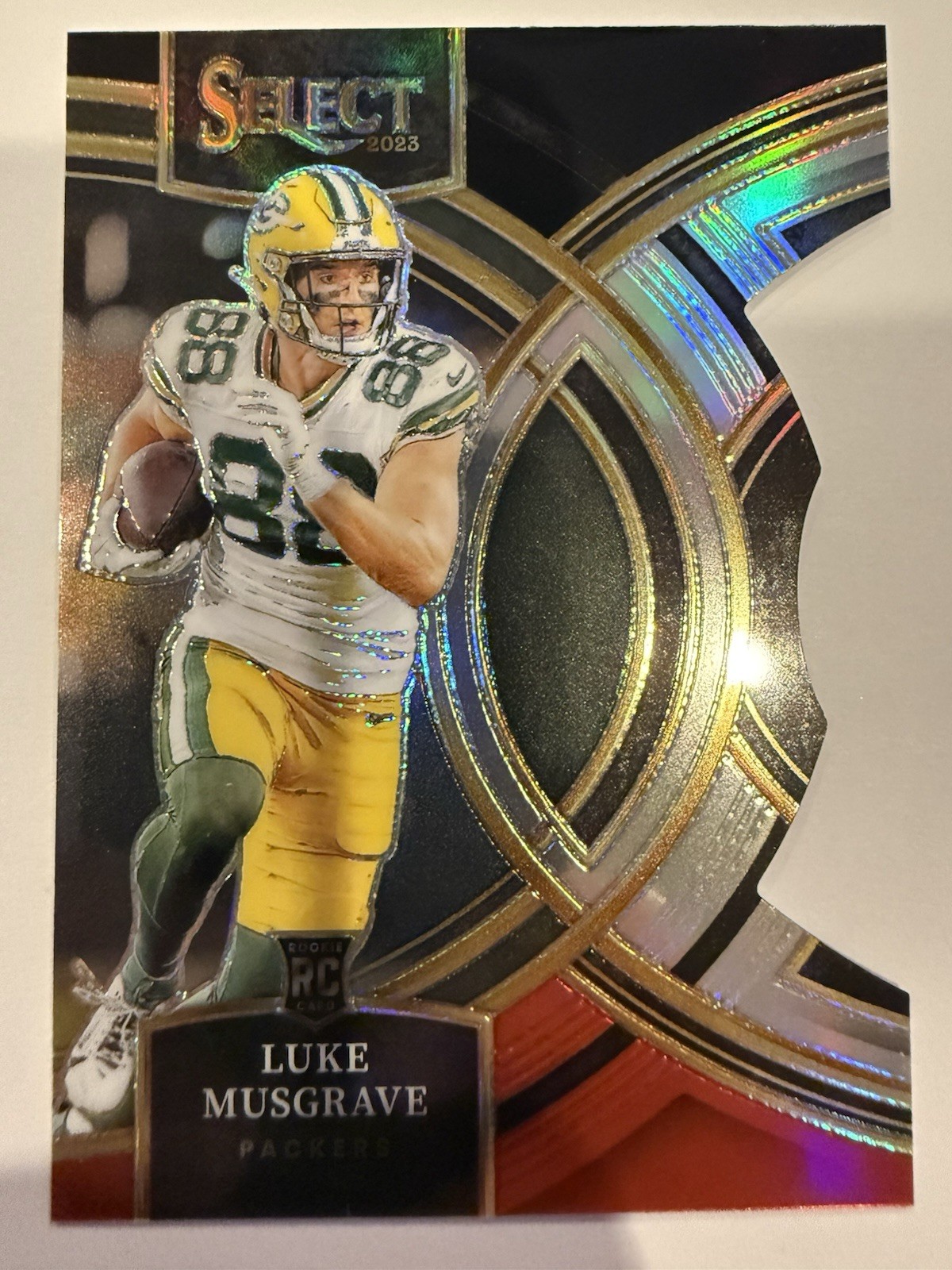 Luke Musgrave -2023 Panini Select - Premier Level #166 Red & Yellow Die-Cut (RC)