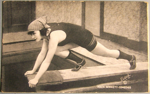 C. 1915, Mack Sennett Studios, Marie Prevost, Mabel Normand, on a diving board - Picture 2 of 4