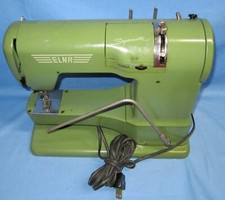 Vintage Elna Sewing Machine with Case ... sold as is for parts or repair 