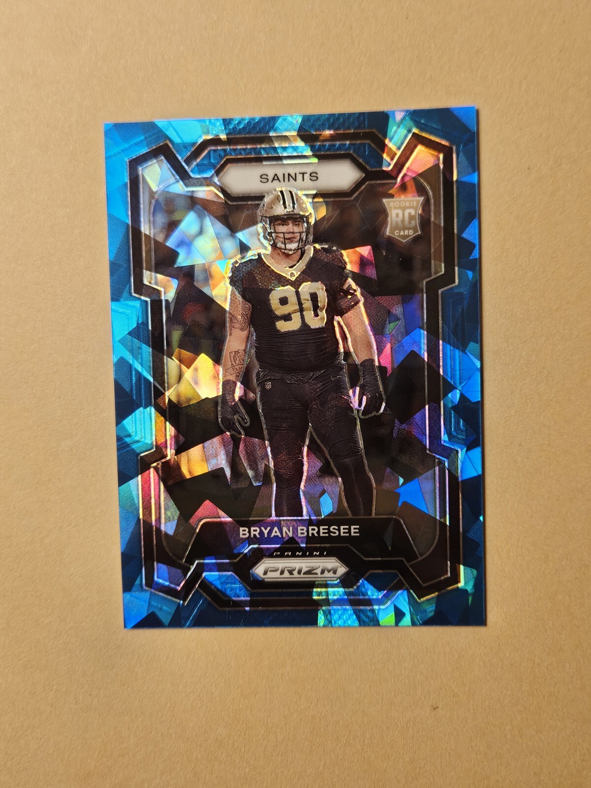 2023 Panini Prizm Bryan Bresee Blue Cracked Ice /99 Saints Rookie RC #372