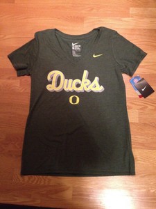 camiseta nike gris mujer