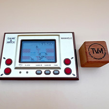 Thumbnail of ebay&reg; auction 800226422253 | Vintage 1981 Nintendo Game & Watch Manhole MH-06 Gold Series Tested Working MIJ