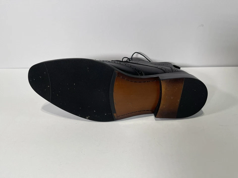 Botas al tobillo Express de cuero negras con punta de ala brogue para hombre talla 11 usadas precio de venta sugerido por el fabricante $148 Foto 3 de 4
