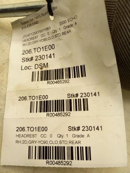 Toyota Echo 2000 lado del pasajero trasero gris tela reposacabezas montaje  Foto 4 de 4