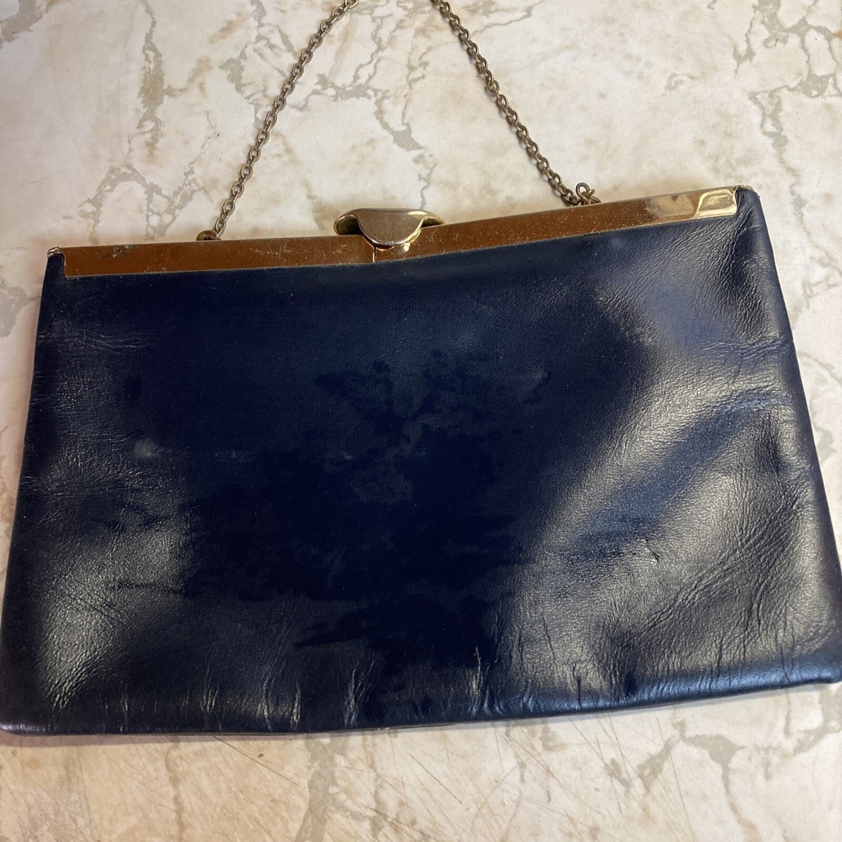 Etra genuine leather clutch sale